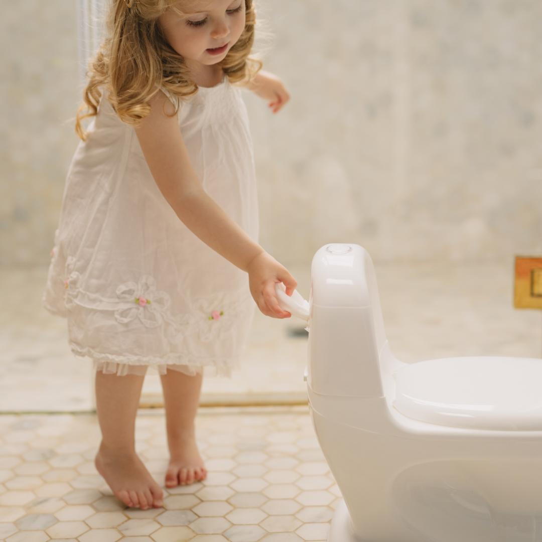 Baby using my real potty